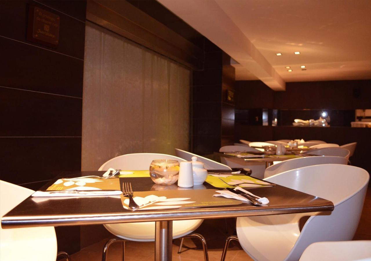 San Simon Hotel Pereira By Soratama 외부 사진 The interior of the restaurant