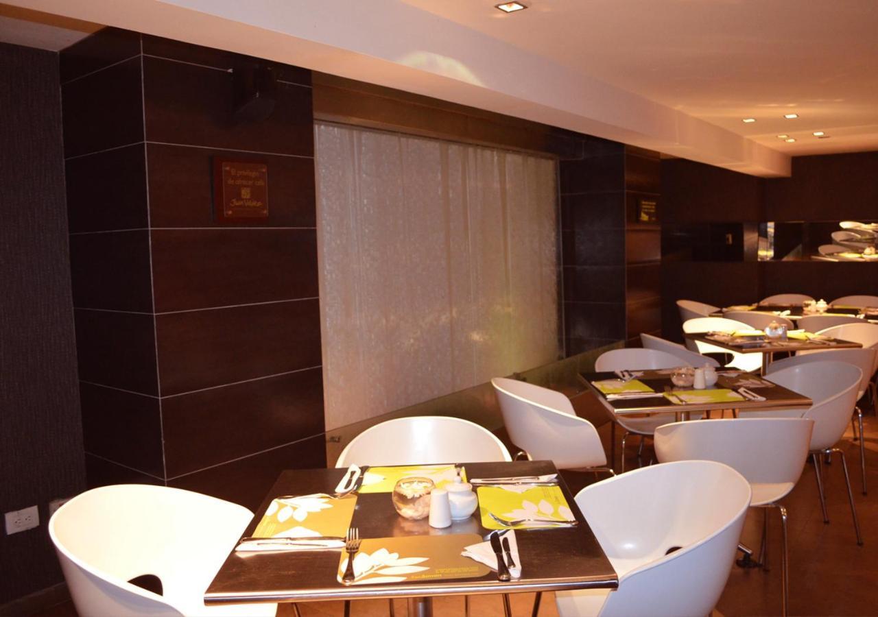 San Simon Hotel Pereira By Soratama 외부 사진 The interior of the restaurant