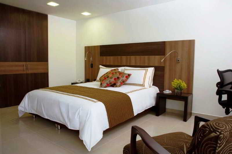 San Simon Hotel Pereira By Soratama 외부 사진 A bedroom